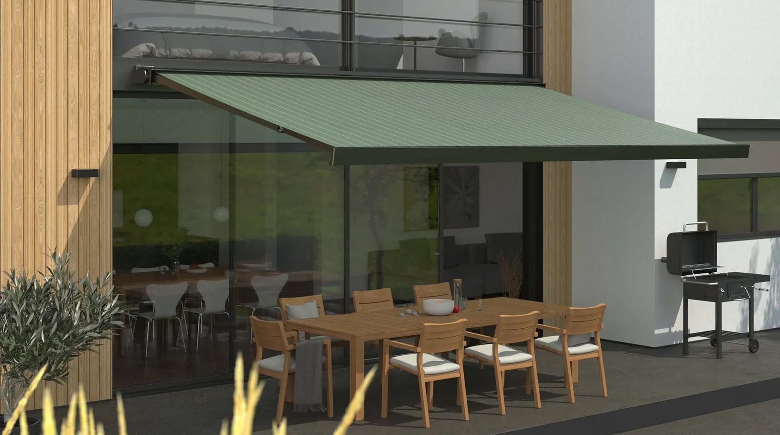 KADECO Kassettenmarkise 310 mit grünem Markisentuch über einer Terrasse – Herstellerabbildung